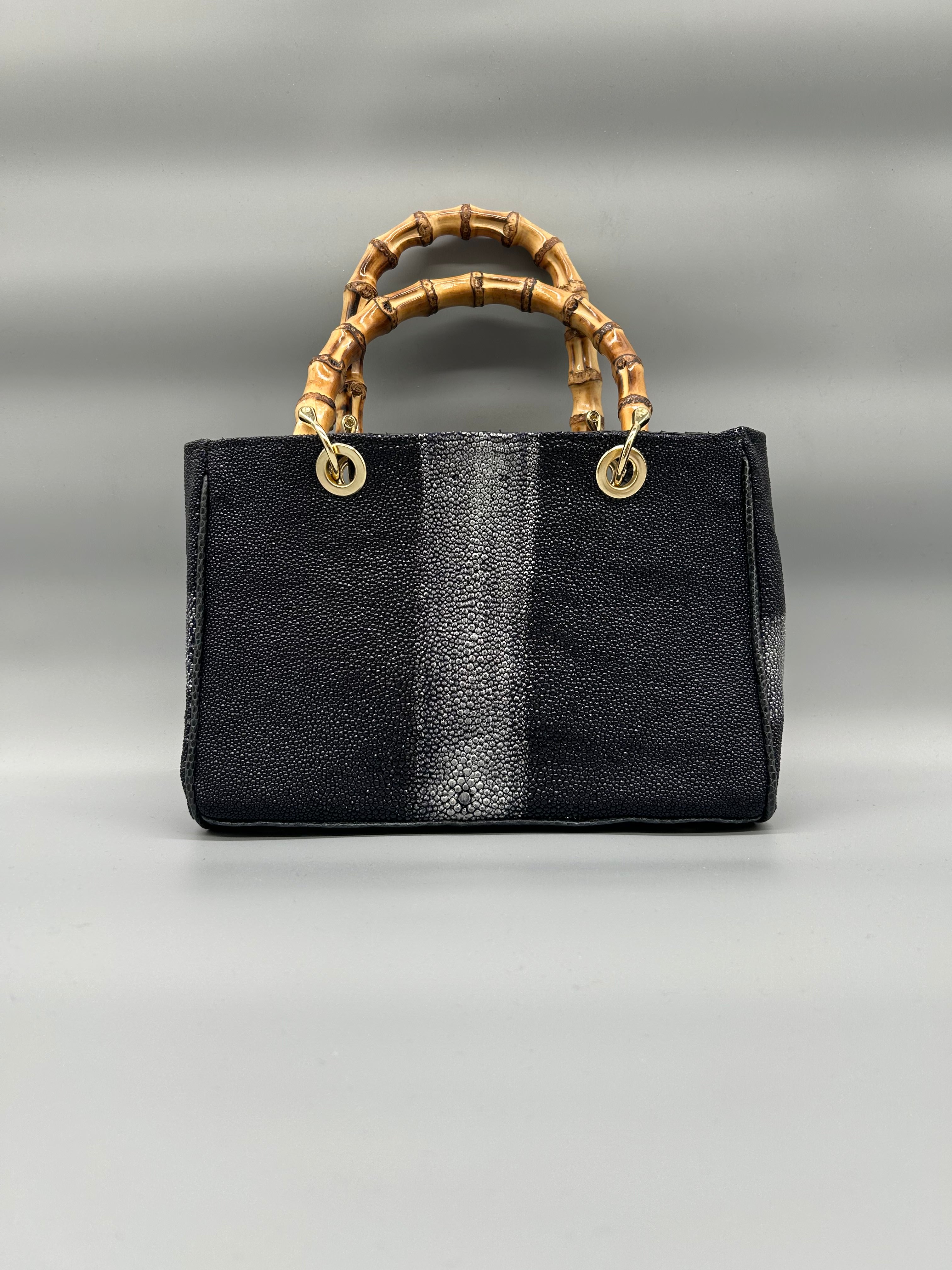 Borsa in pelle di razza e pitone