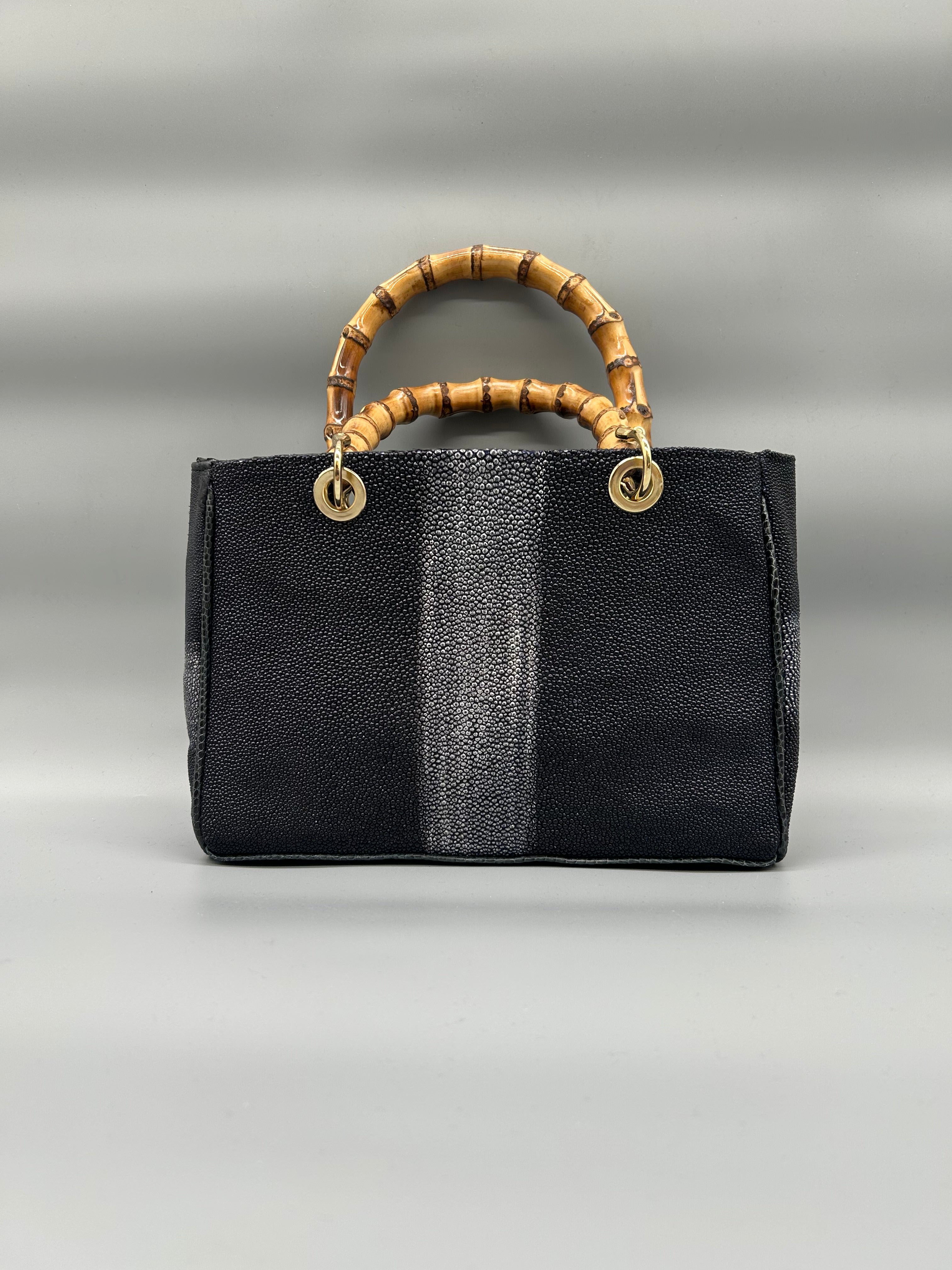 Borsa in pelle di razza e pitone
