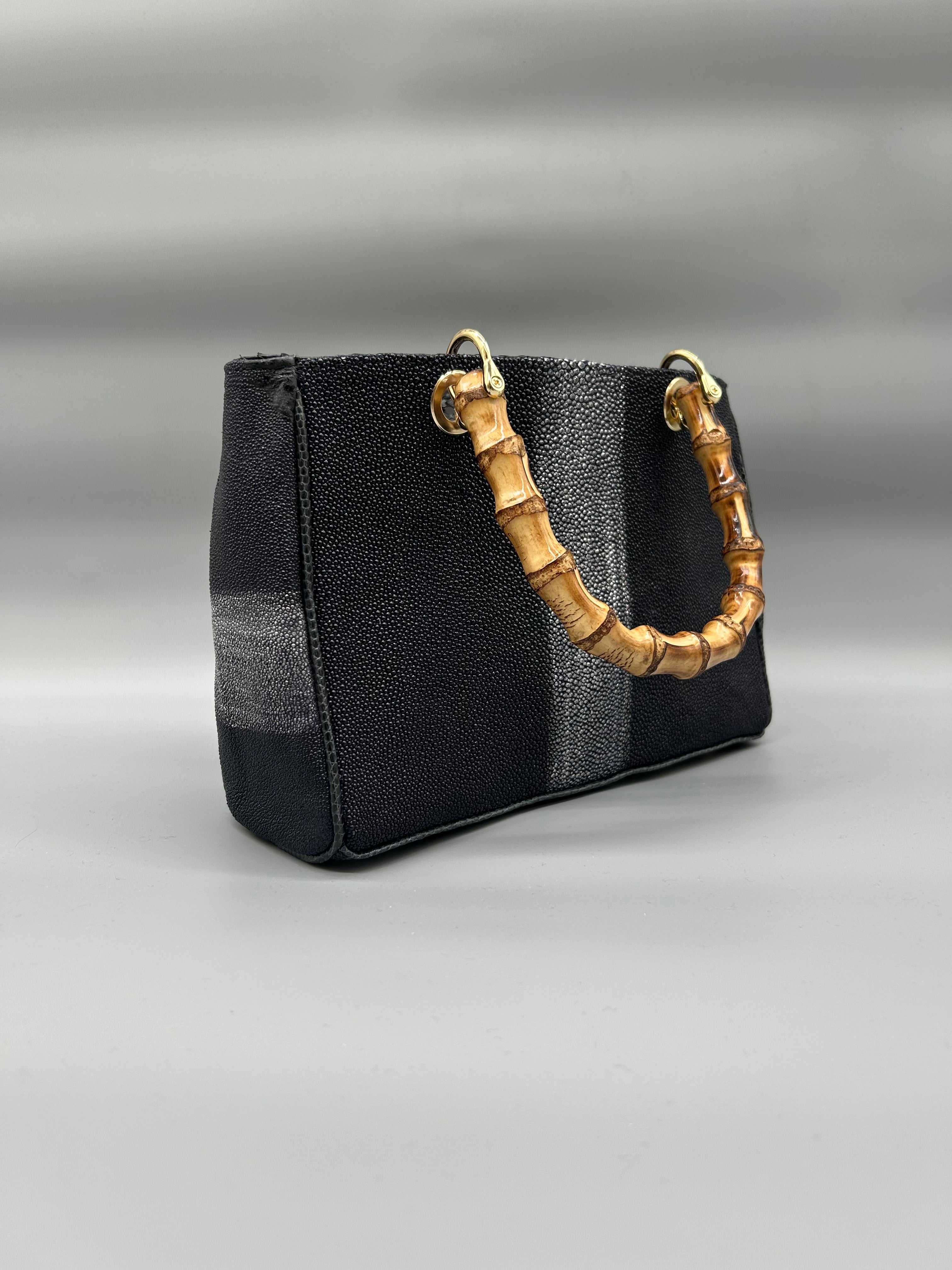 Borsa in pelle di razza e pitone
