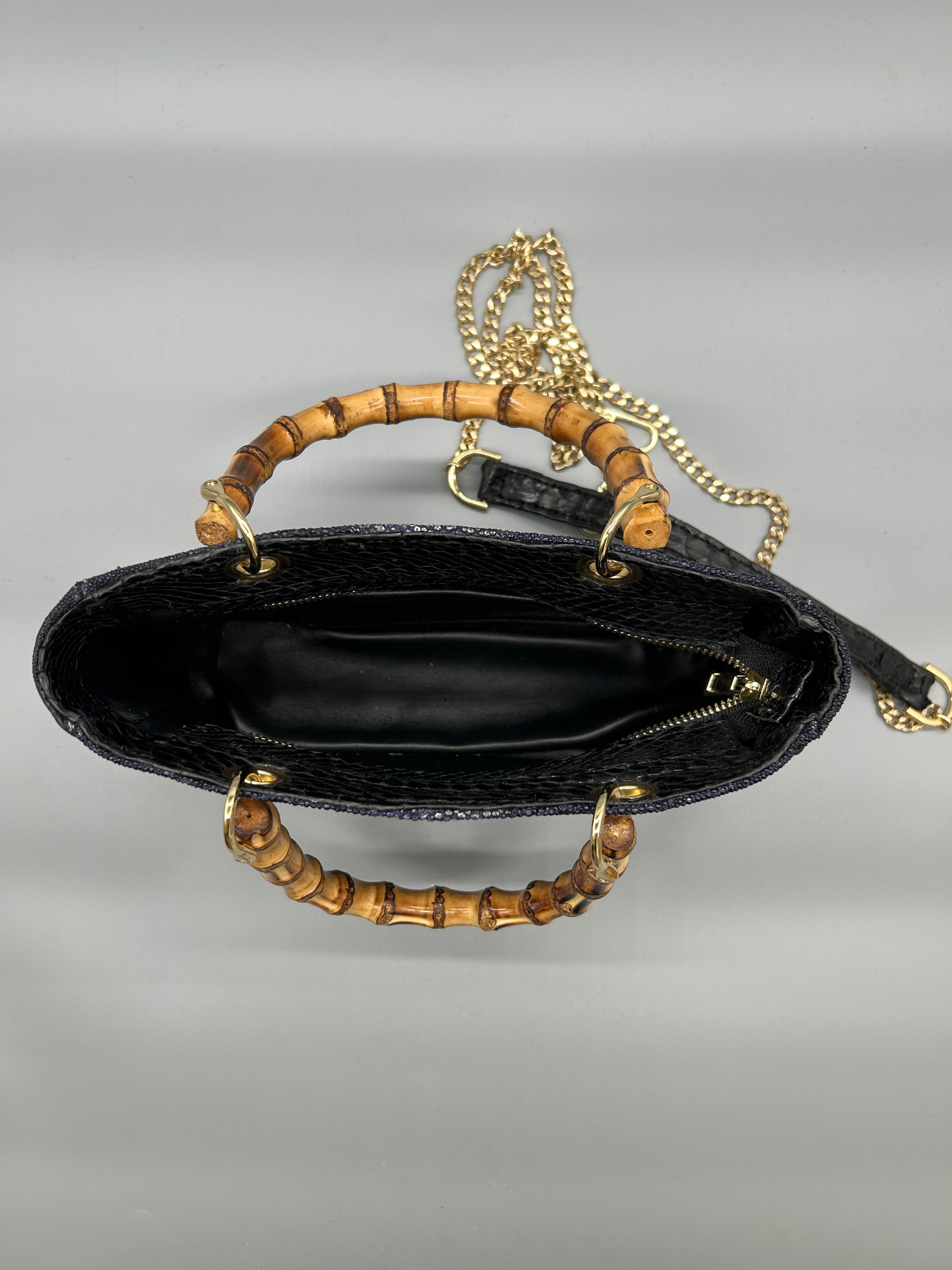 Borsa in pelle di razza e pitone