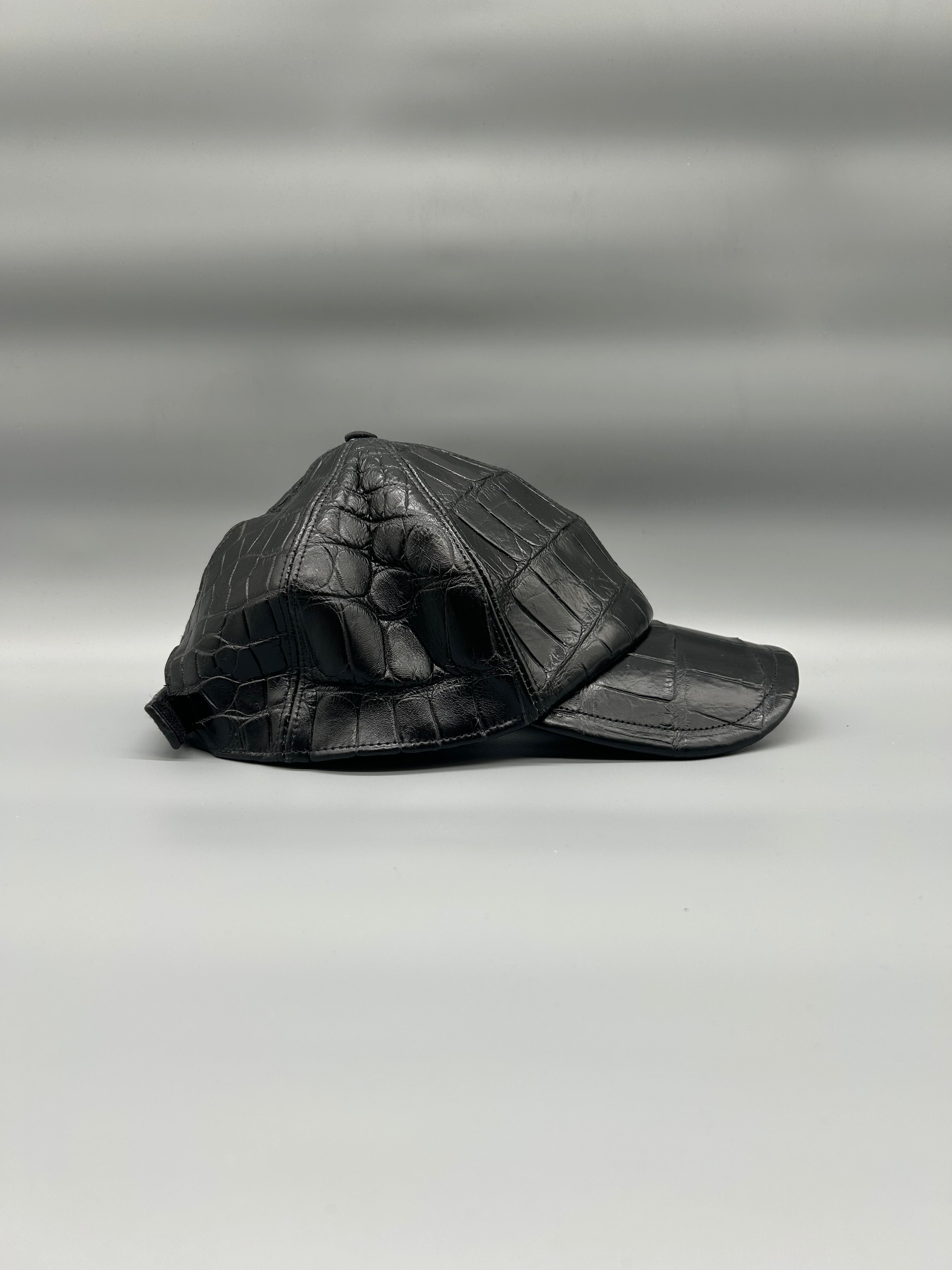 Cappellino con berretto in pelle di coccodrillo