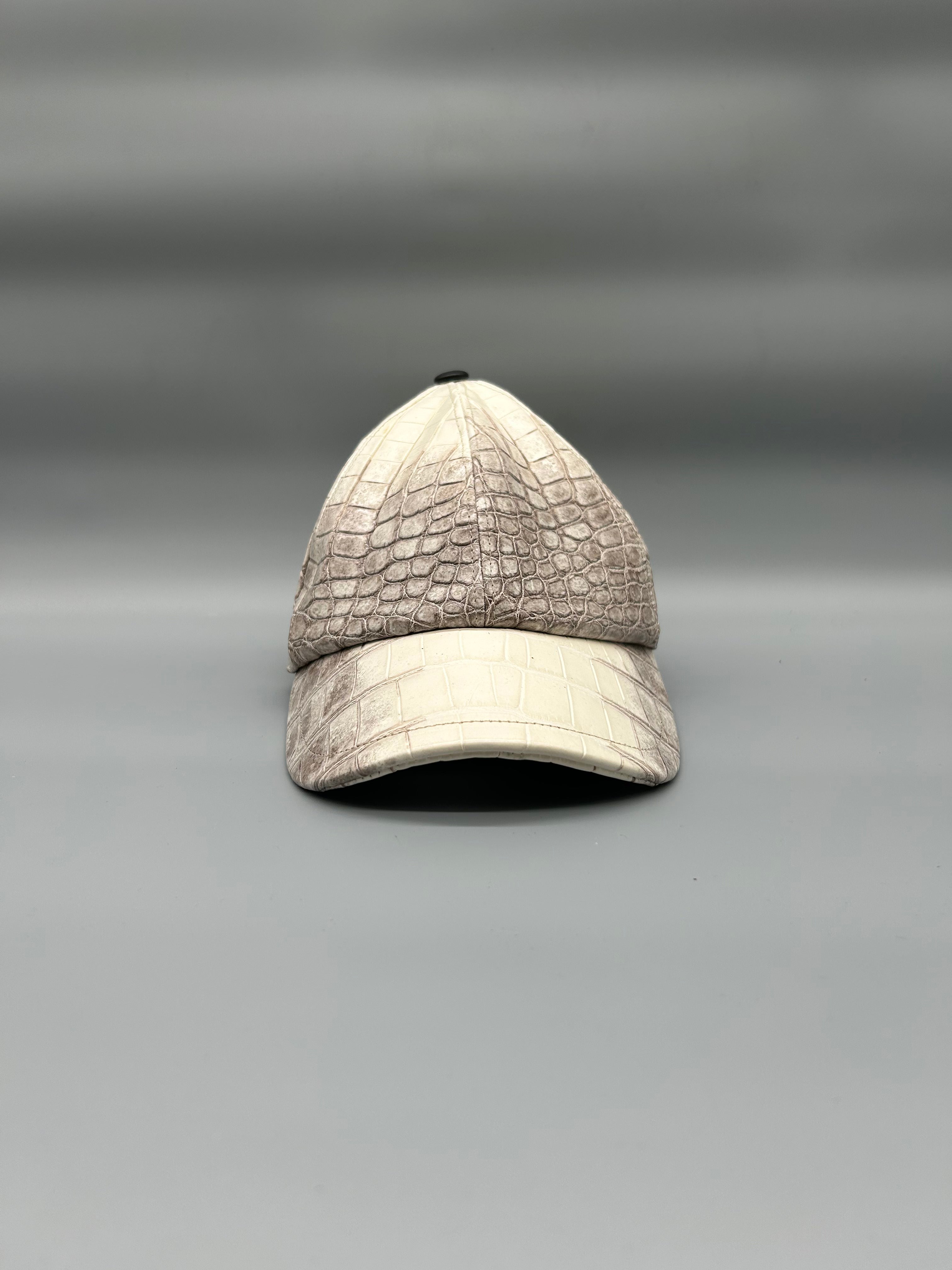 Cappellino con berretto in pelle di coccodrillo
