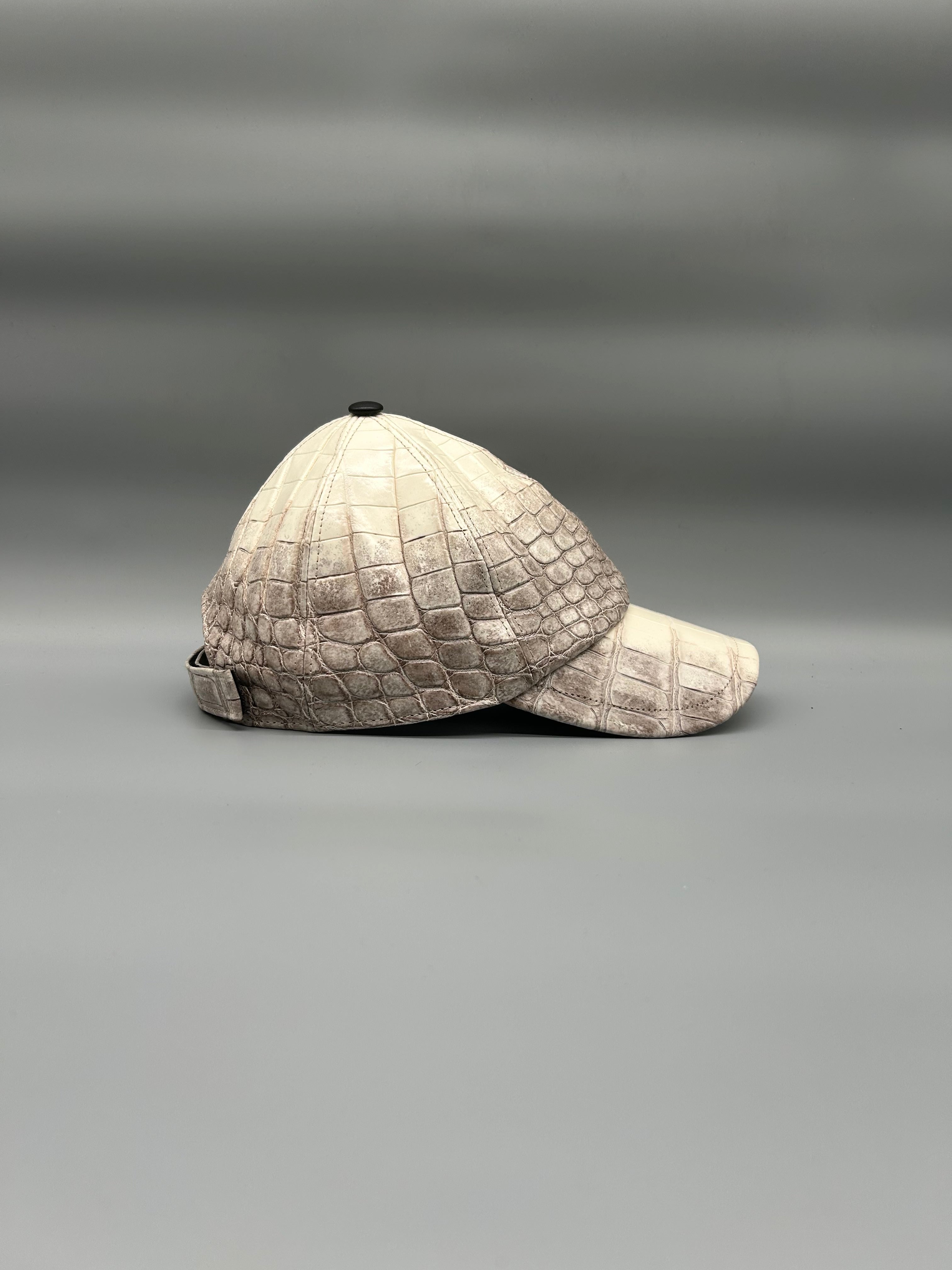 Cappellino con berretto in pelle di coccodrillo
