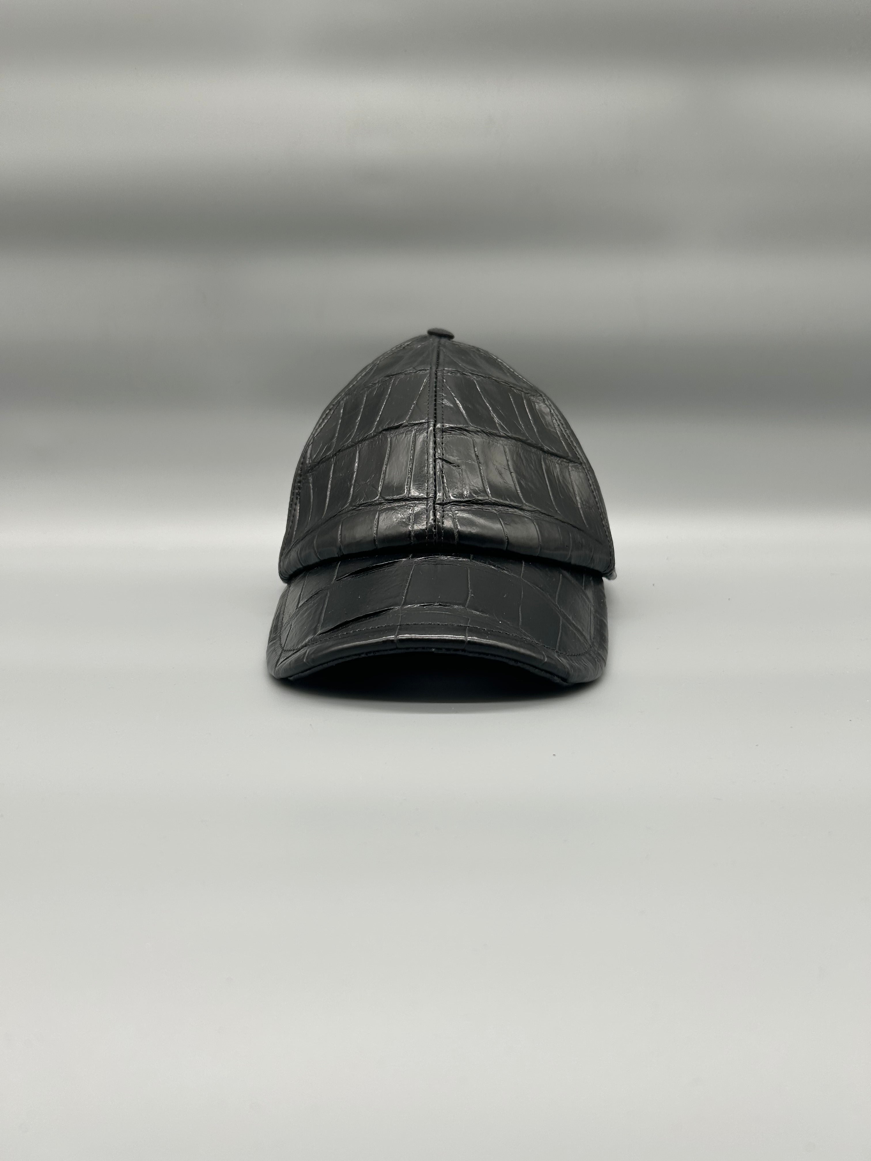 Cappellino con berretto in pelle di coccodrillo